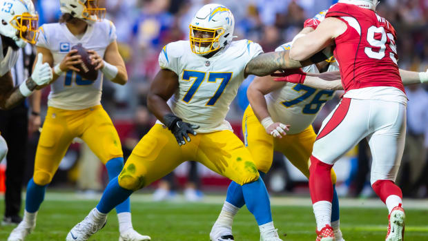 Nov 27, 2022; Glendale, AZ, USA; Los Angeles Chargers guard Zion Johnson (77) against the Arizona Cardinals at State Farm Stadium. Mandatory Credit: Mark J. Rebilas-USA TODAY Sports